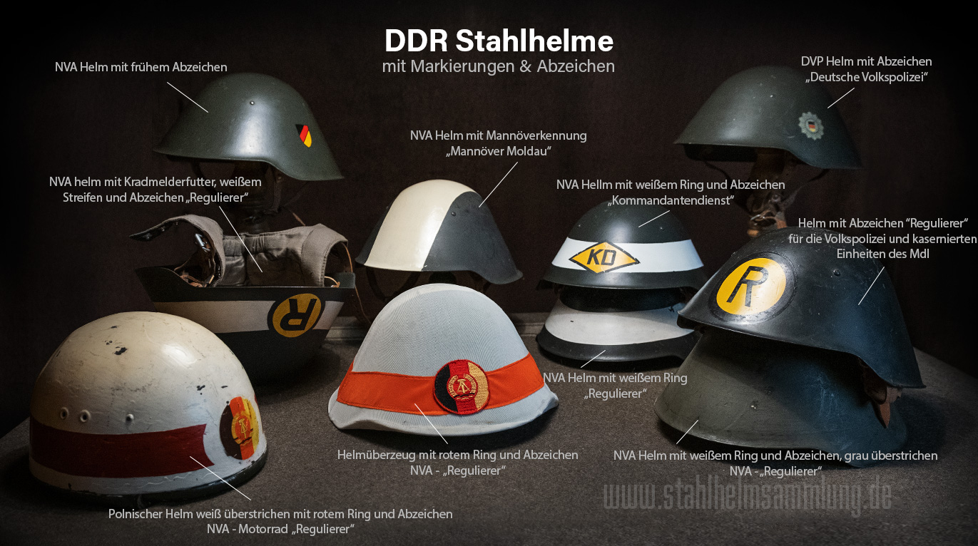 Stahlhelme der DDR mit Abzeichen und Markierungen